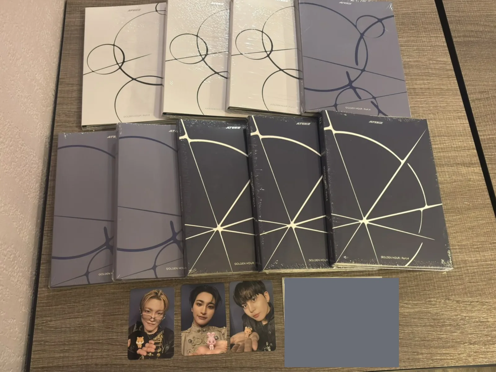 Nine ATEEZ albums with only three photocards received